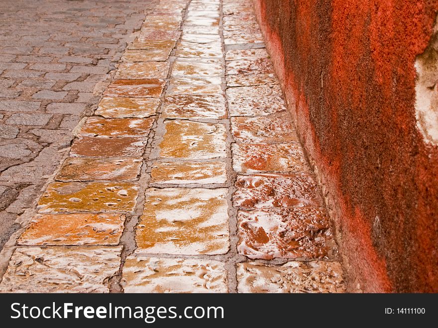 Stone street in the rain