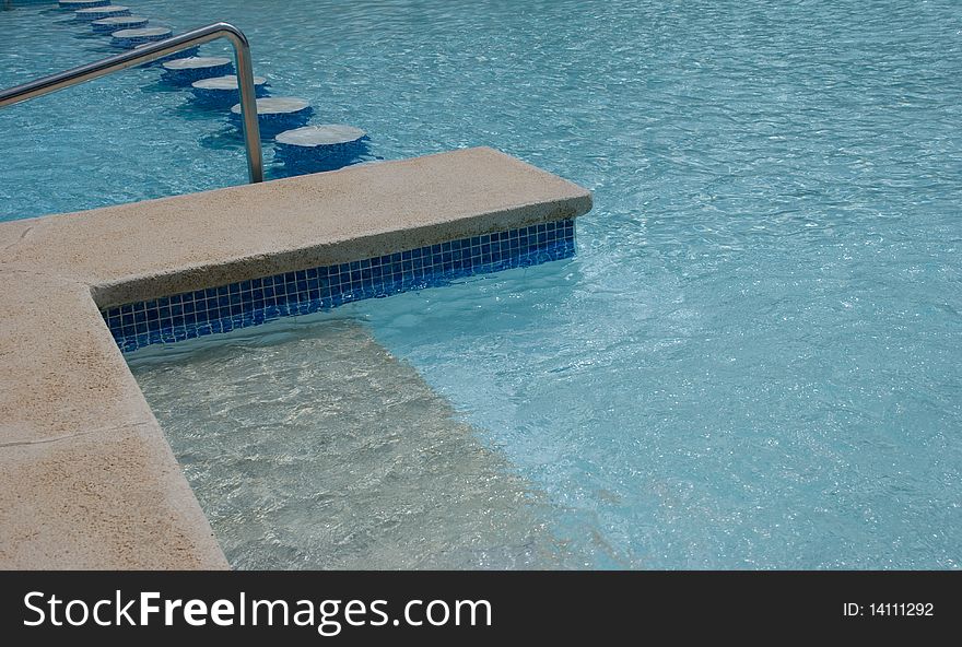 Pool ladders in a summer, water
