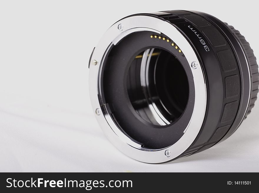 A black 36mm extension tube for a slr camera. A black 36mm extension tube for a slr camera