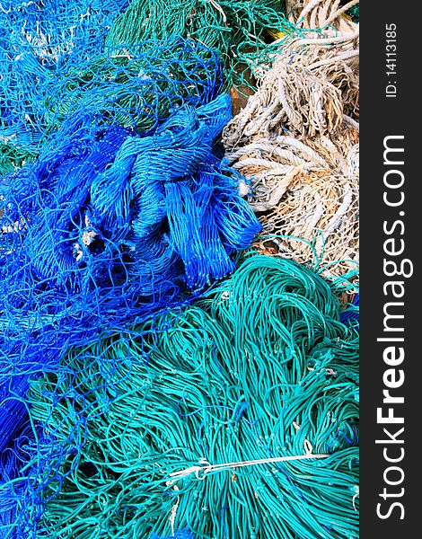 Close up shot of a Blue & white fish nets background. fishing material. Close up shot of a Blue & white fish nets background. fishing material.