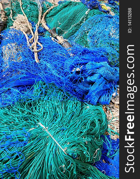 Close up shot of a Blue & white fisn net. background. fisihng material. Close up shot of a Blue & white fisn net. background. fisihng material.