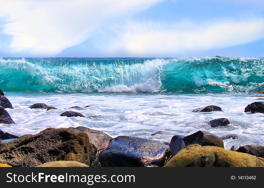 This is a photo of blue ocean and sky with clouds