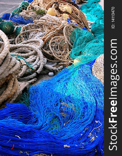 Close up shot of a Blue & white fish nets background. fishing material. Close up shot of a Blue & white fish nets background. fishing material.