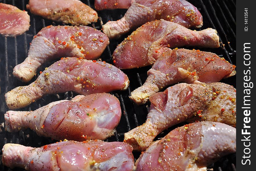 Chicken Legs on the grill with barbecue. Chicken Legs on the grill with barbecue