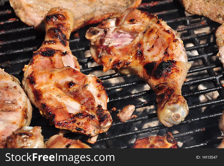 Chicken Legs on the grill with barbecue. Chicken Legs on the grill with barbecue