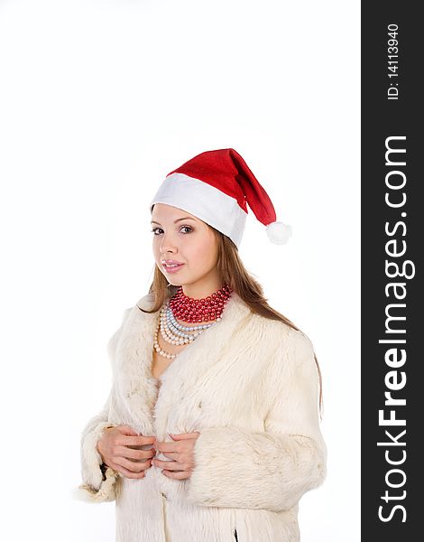 Young beautiful girl in Santa Claus hat. Young beautiful girl in Santa Claus hat