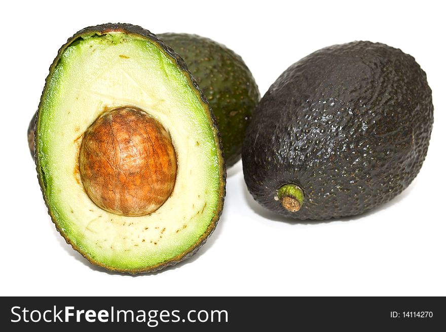 Beautiful, ripe avocados on a white background. Beautiful, ripe avocados on a white background.