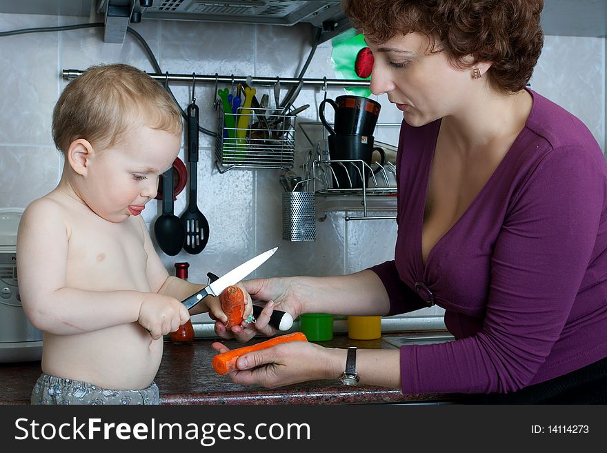 Mother and son cooking