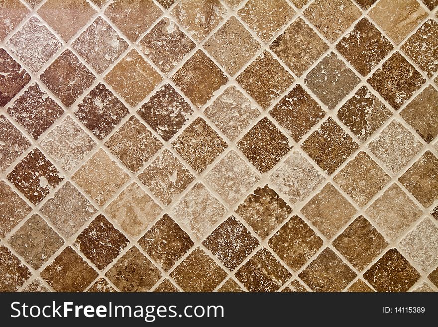 Close up of the wall in a bathroom with stone tiles. Close up of the wall in a bathroom with stone tiles