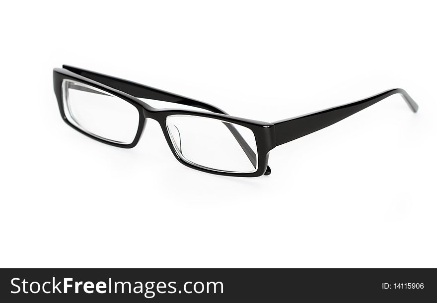 Modern black eyeglasses isolated on white background