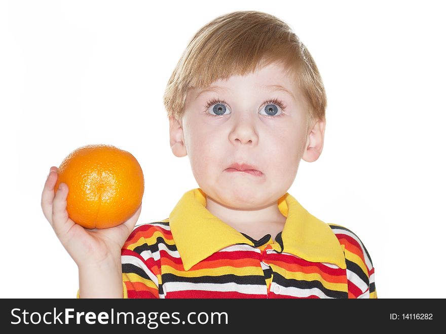 The child with an orange in a hand