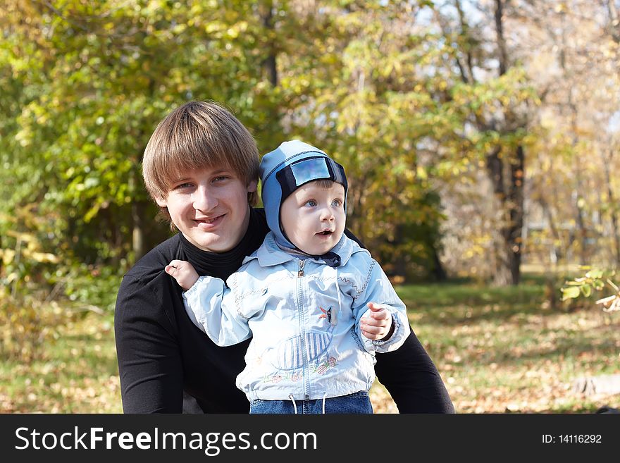 The daddy with the small son on walk. The daddy with the small son on walk