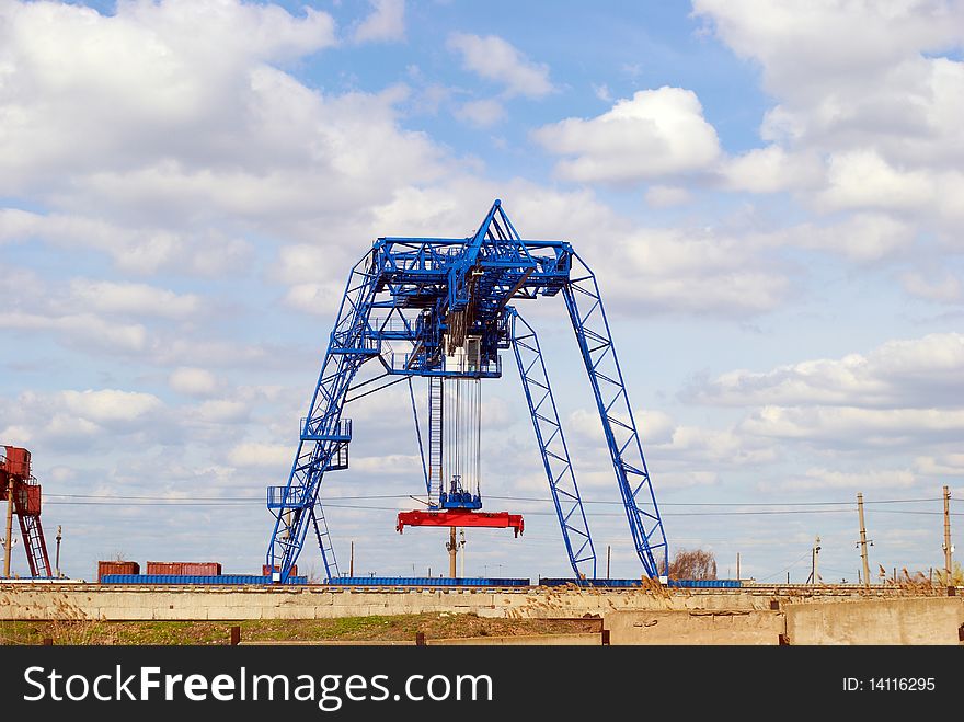 The container Terminal at railway station on a background of the dark blue sky