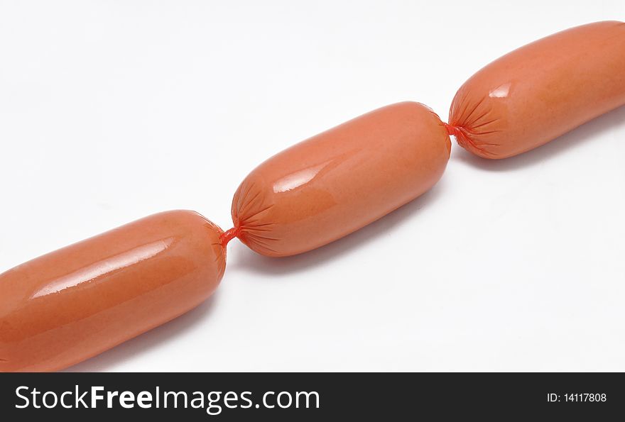 Picture of sparse sausages on a white background