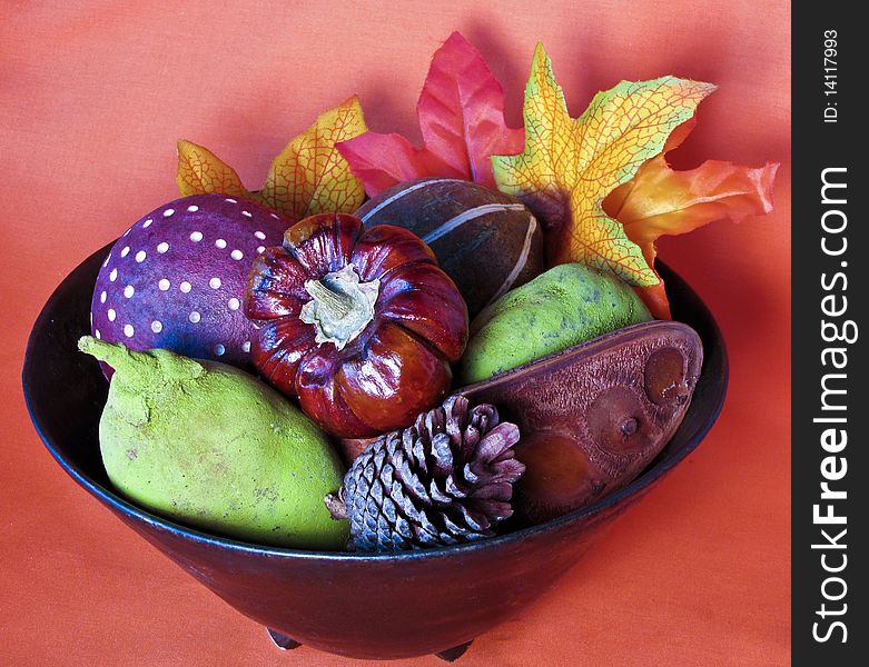 Autumn Stilllife in a bowl with orange background. Autumn Stilllife in a bowl with orange background