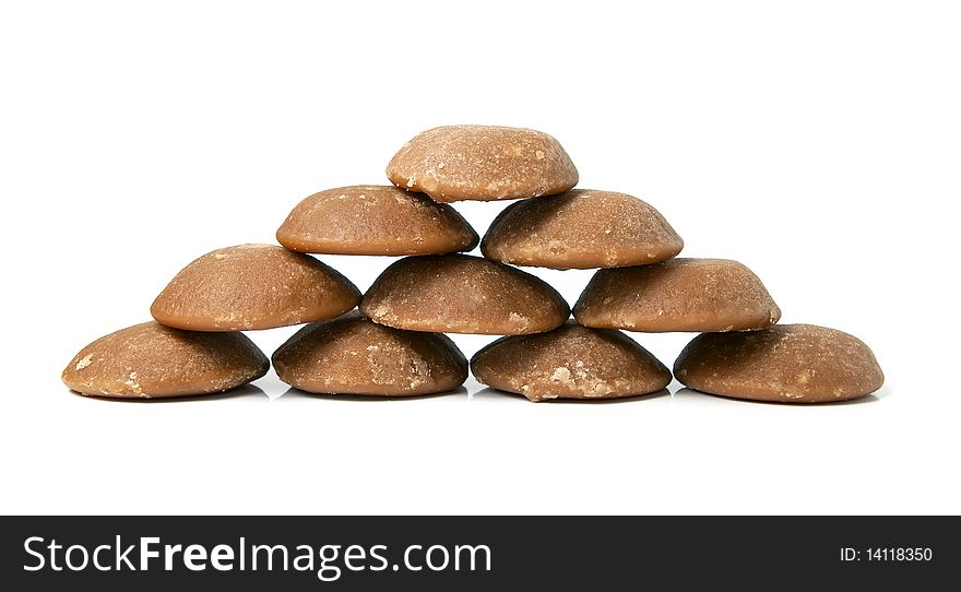 Heap of brown can sugar. Sweet and healthy. Isolated on white. Heap of brown can sugar. Sweet and healthy. Isolated on white