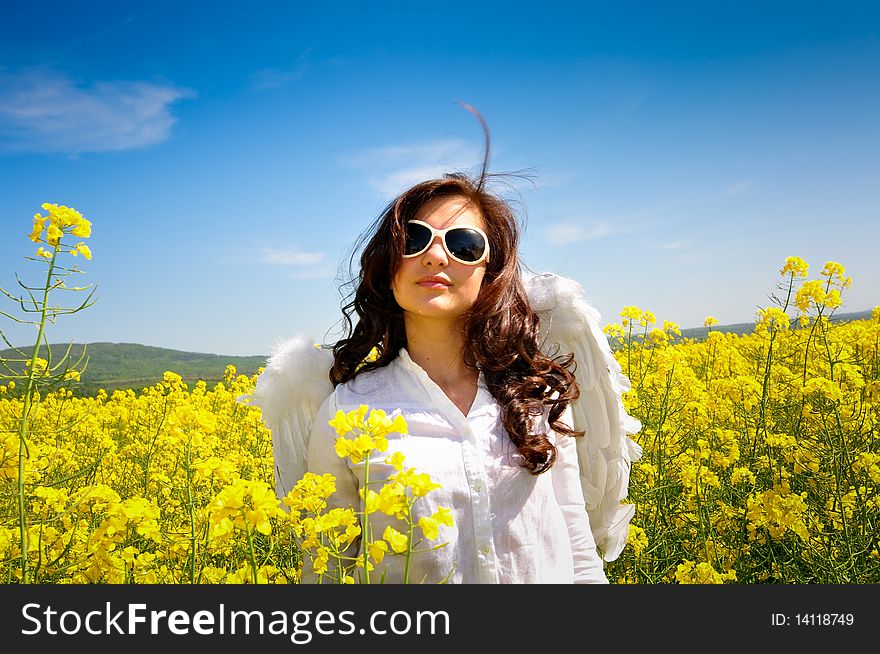 Happy girl with angel wings