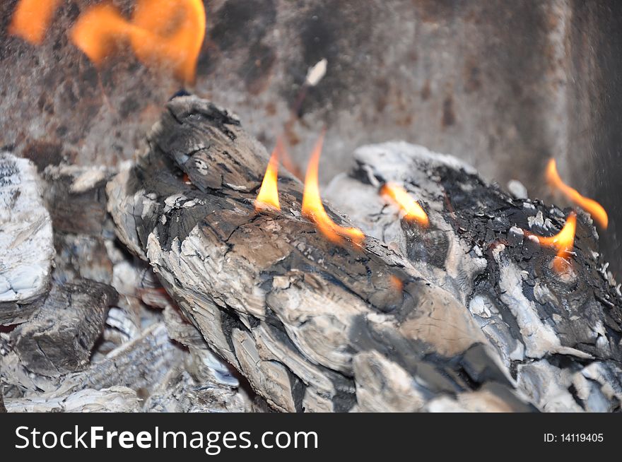 Picture of logs in flame of fire which burn out. Picture of logs in flame of fire which burn out