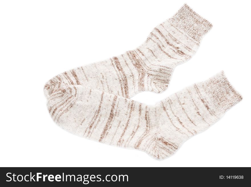 Knitted socks on a white background