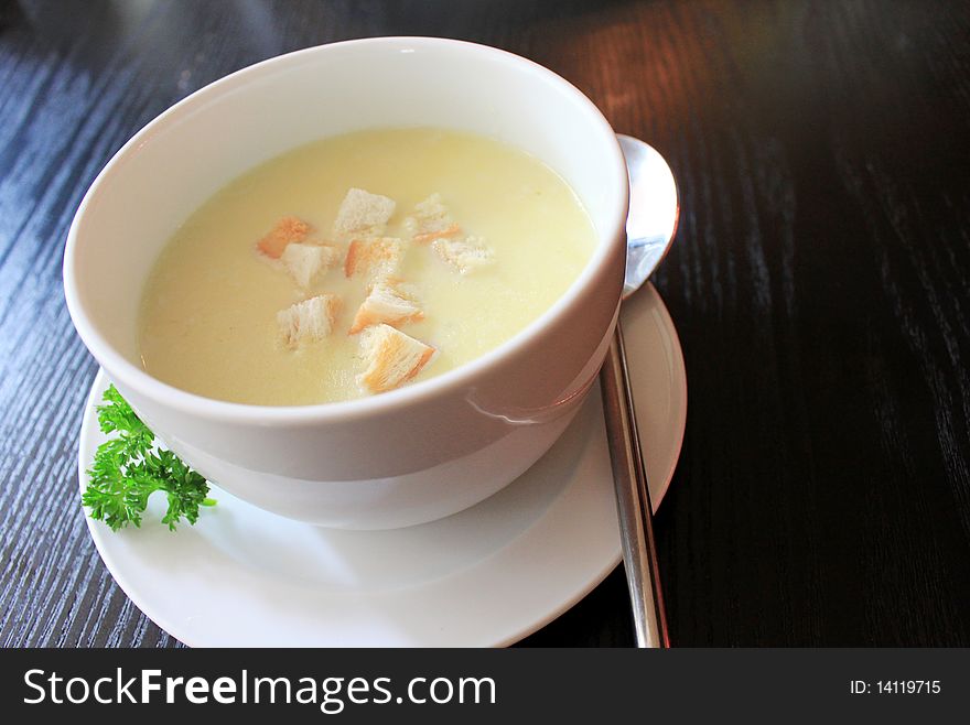 Tasty cream soup with bread