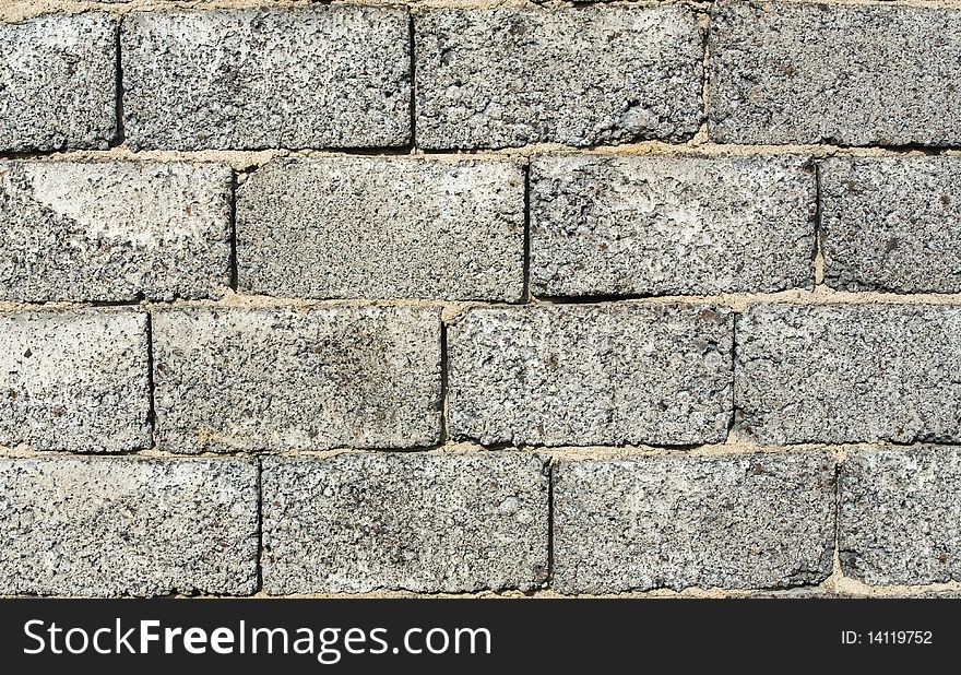 Pattern of gray brick wall, unfinished house wall. Pattern of gray brick wall, unfinished house wall.