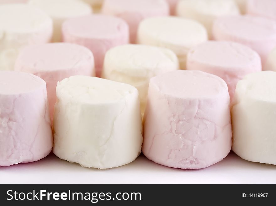 Close up of pink and white marshmallows