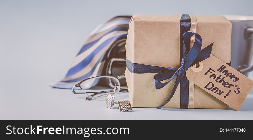 Fathers day concept - present, coffee, tie, mustache copy space