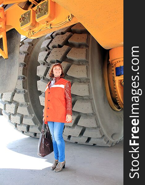 Woman at the big truck. Woman at the big truck