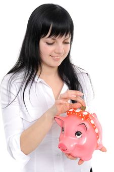 Woman With A Piggy-bank Stock Photography