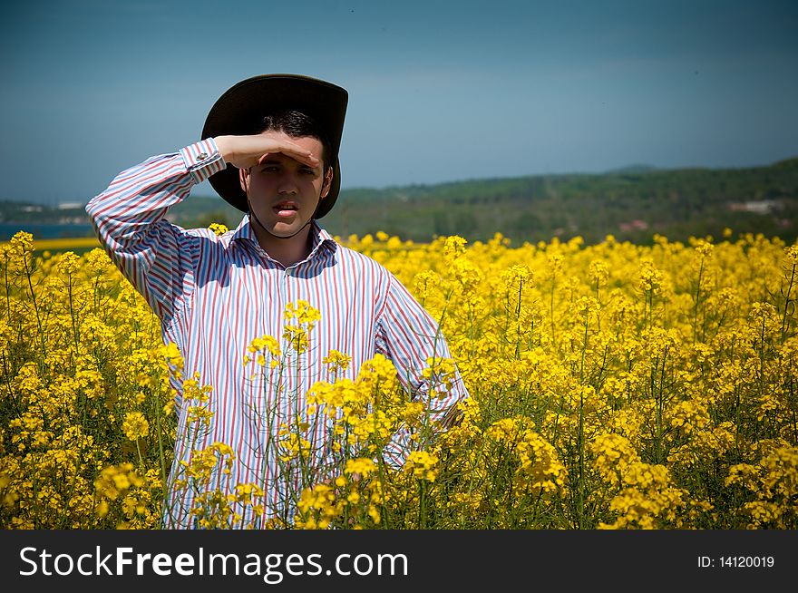 Young man in rape field