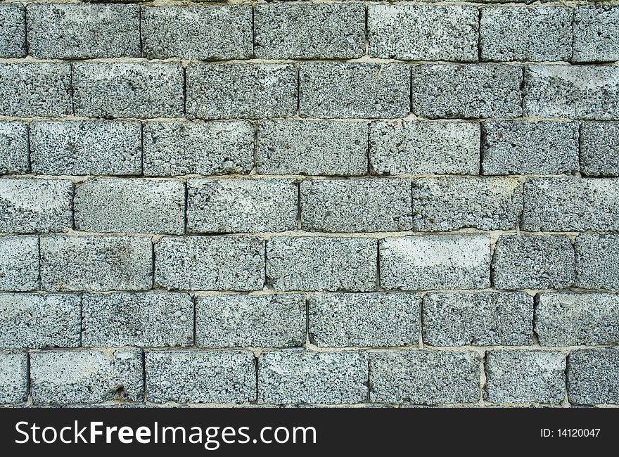 Pattern of gray brick wall, unfinished house wall. Pattern of gray brick wall, unfinished house wall.