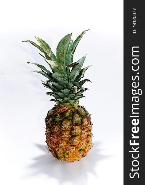 Fresh and juicy pineapple on a white background