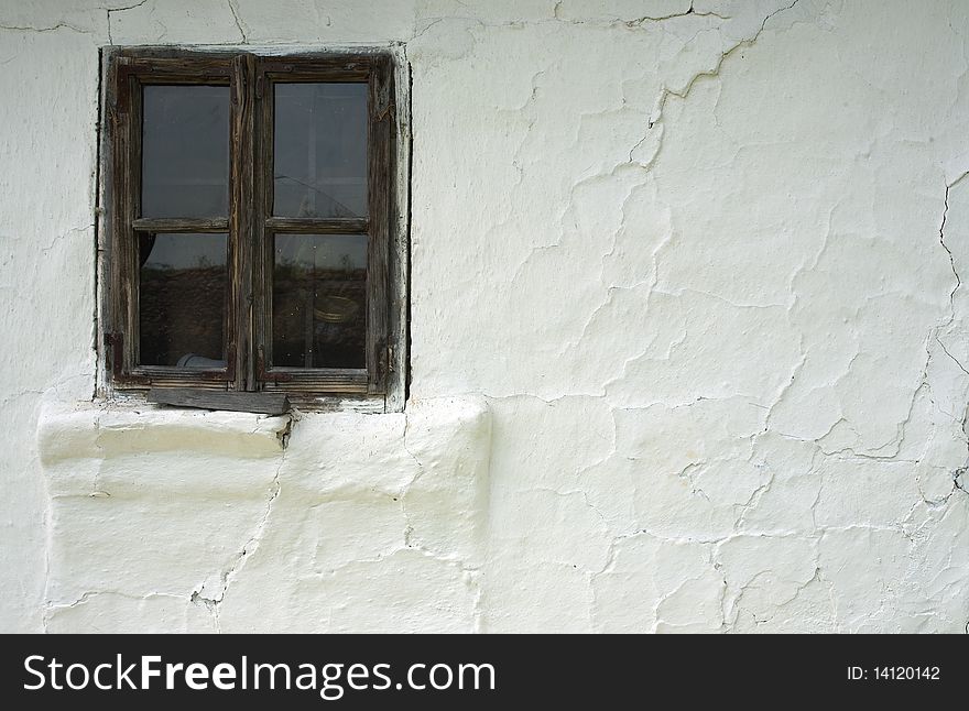 Details of an old window on white wall. Details of an old window on white wall.