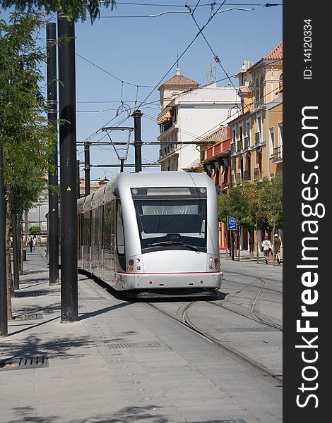 A moving tram in the city. A moving tram in the city