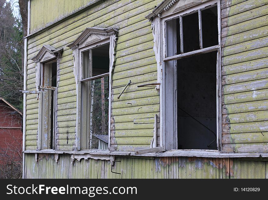 Broken Windows Of Abandoned House