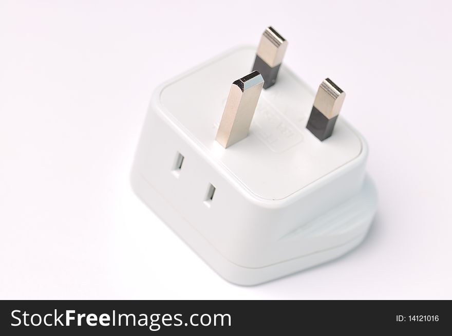 Travel adapter on a white background. Travel adapter on a white background.