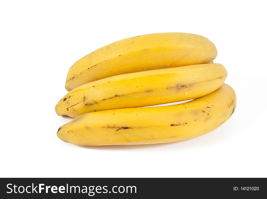 Three mature bananas on white background