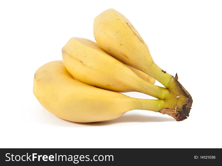 Three mature bananas on white background