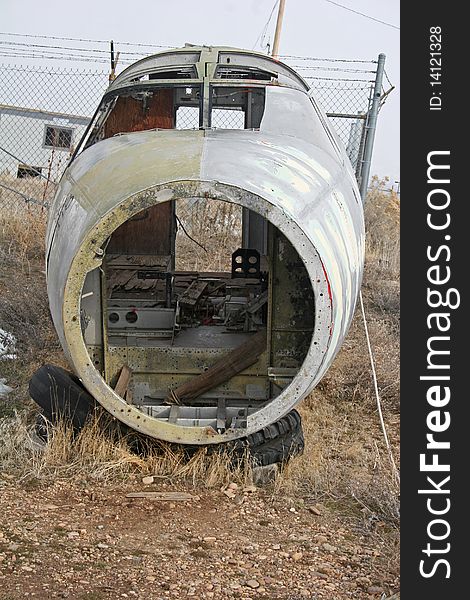 Nose of derelict airplane on ground