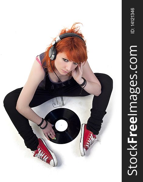 Punk girl with headphones and record. Punk girl with headphones and record