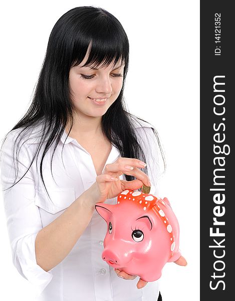 Young beautiful woman standing with piggy-bank (money box), isolated on white background. Young beautiful woman standing with piggy-bank (money box), isolated on white background