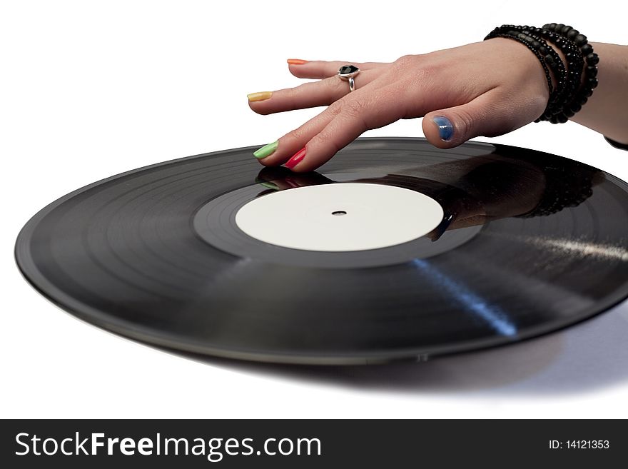 Vinyl music record with a hand on it. Vinyl music record with a hand on it