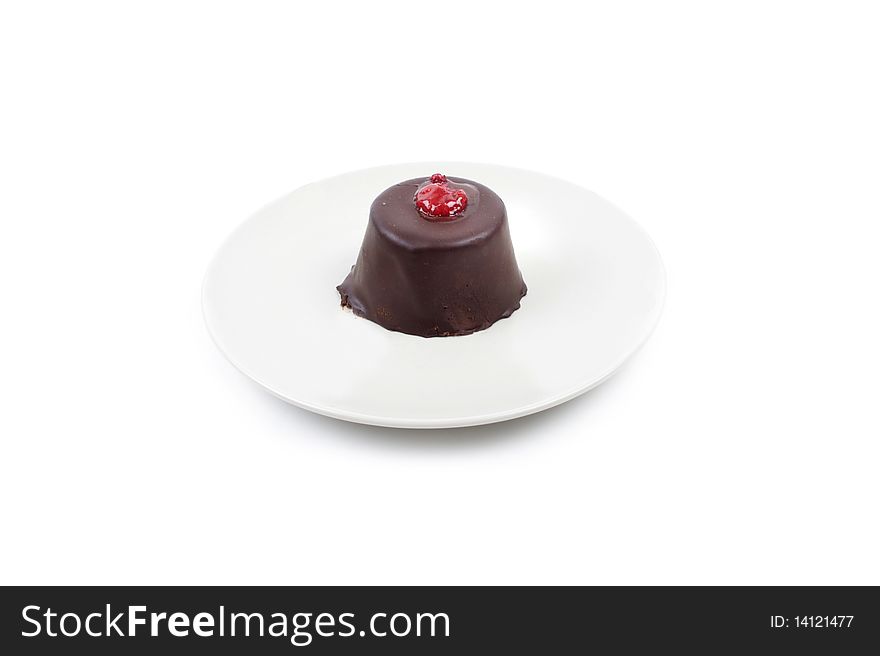 Piece of chocolate cake on a white plate