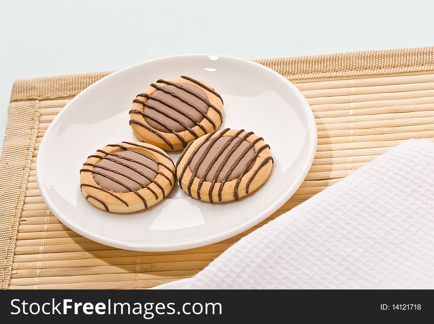 Food series: sweet chocolate pastry on the white plate