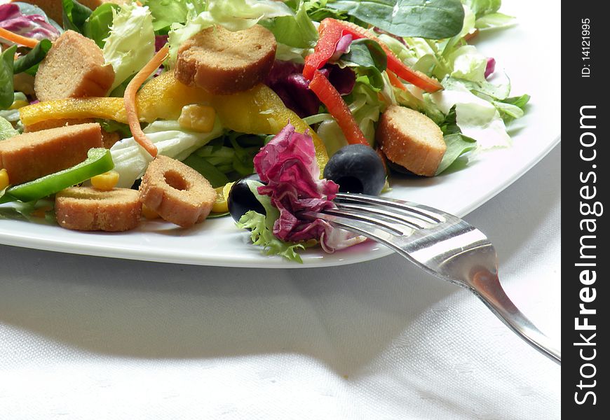 Fresh organic salad on white background