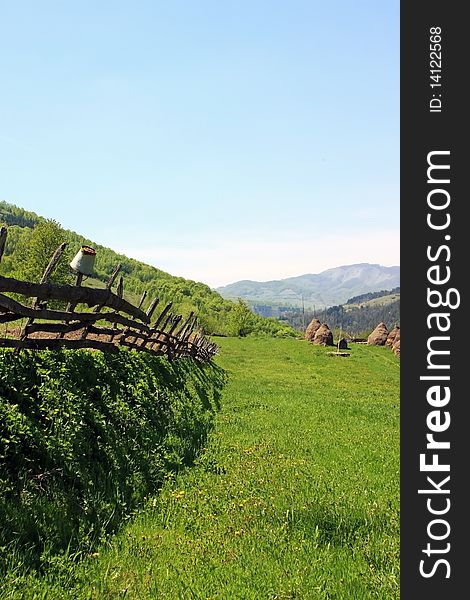 Green landscape during the spring with mountains in the background. Green landscape during the spring with mountains in the background