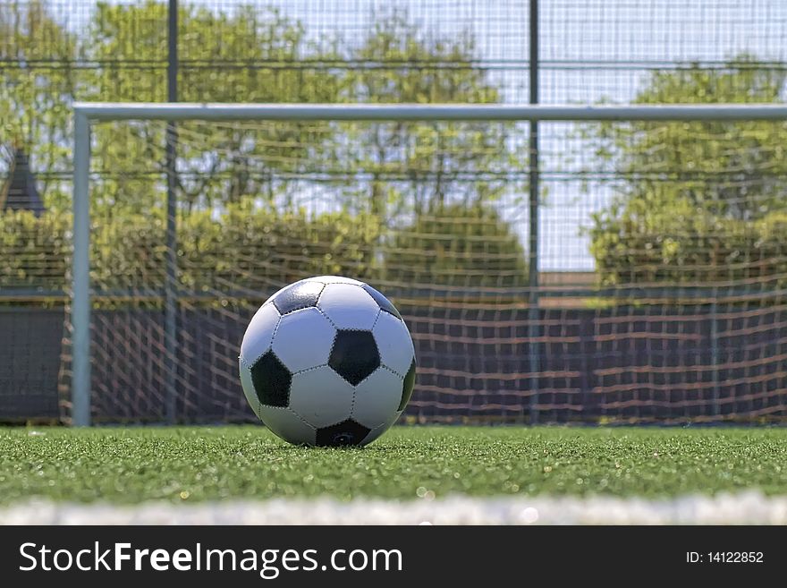 Beautiful football ball in grass with great colors