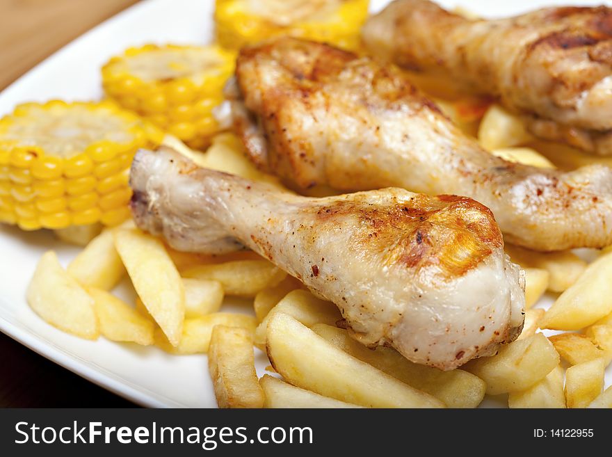 Grilled chicken leg and chips
