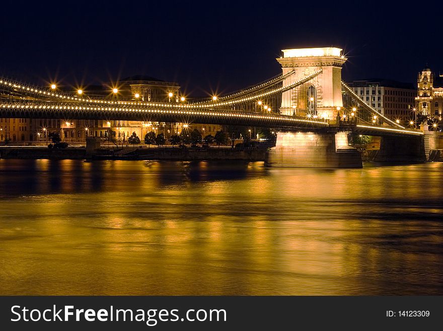 Budapest, with beautiful night lighting and bridges.