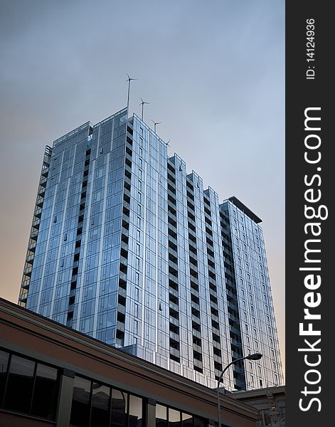 Building with wind turbines on roof, Twelve West Building, Portland, Oregon. Building with wind turbines on roof, Twelve West Building, Portland, Oregon